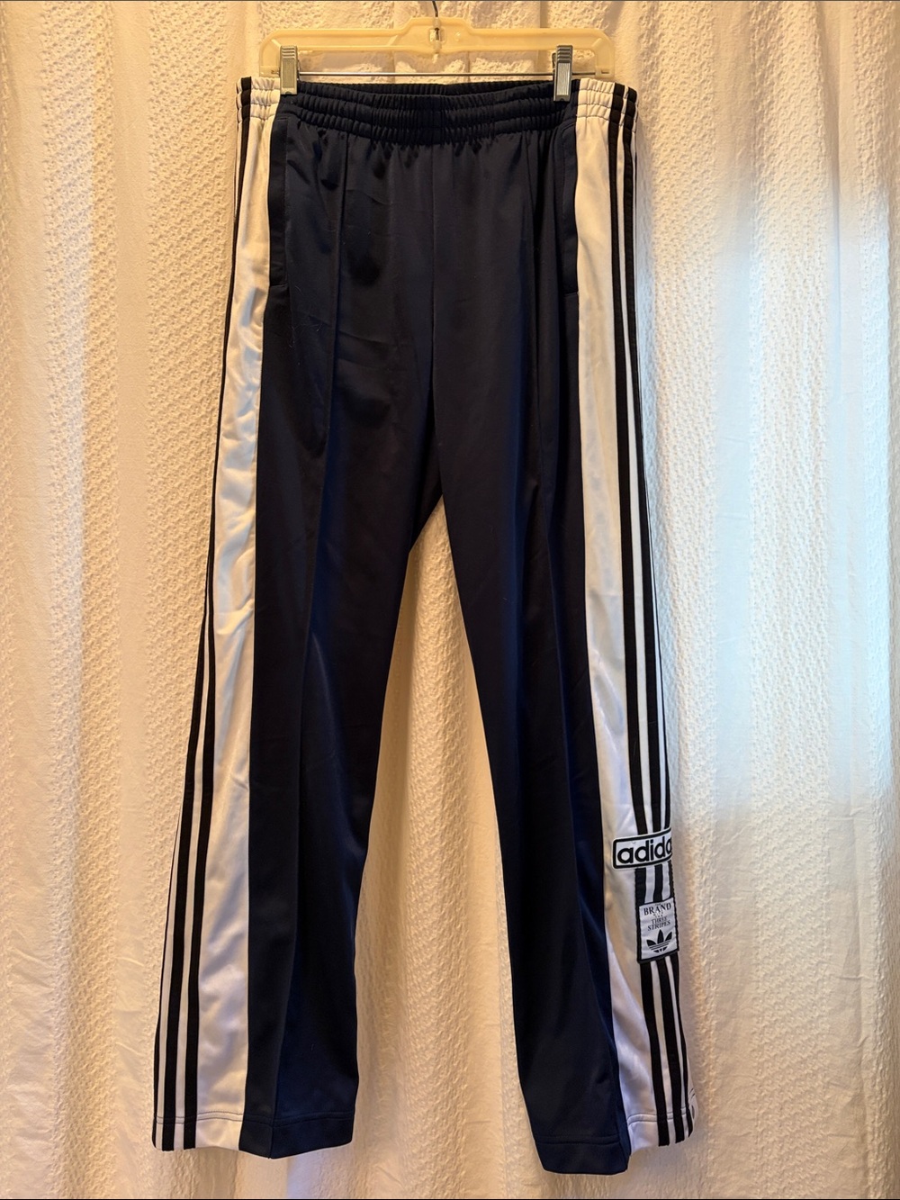 Adidas Tearaway track pant size M-women’s navy/black stripe.